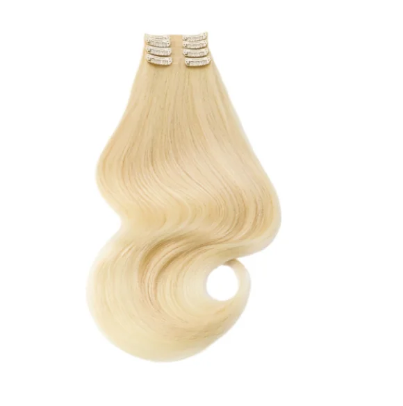 Blonde human hair one-piece clip-in volumizer showing the clip attachment and finished length