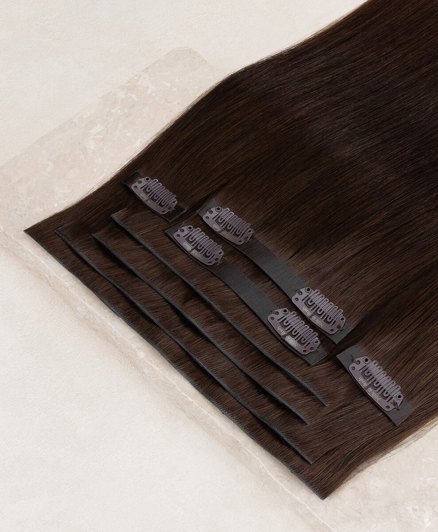 Seamless invisible clip-in extensions with flat PU base