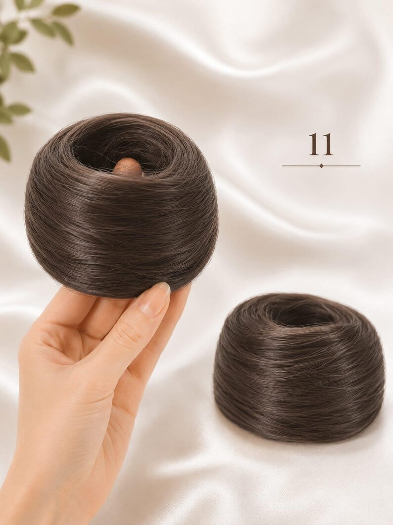 Dark-brown synthetic hair bun scrunchie shown as a compact wrapped bun